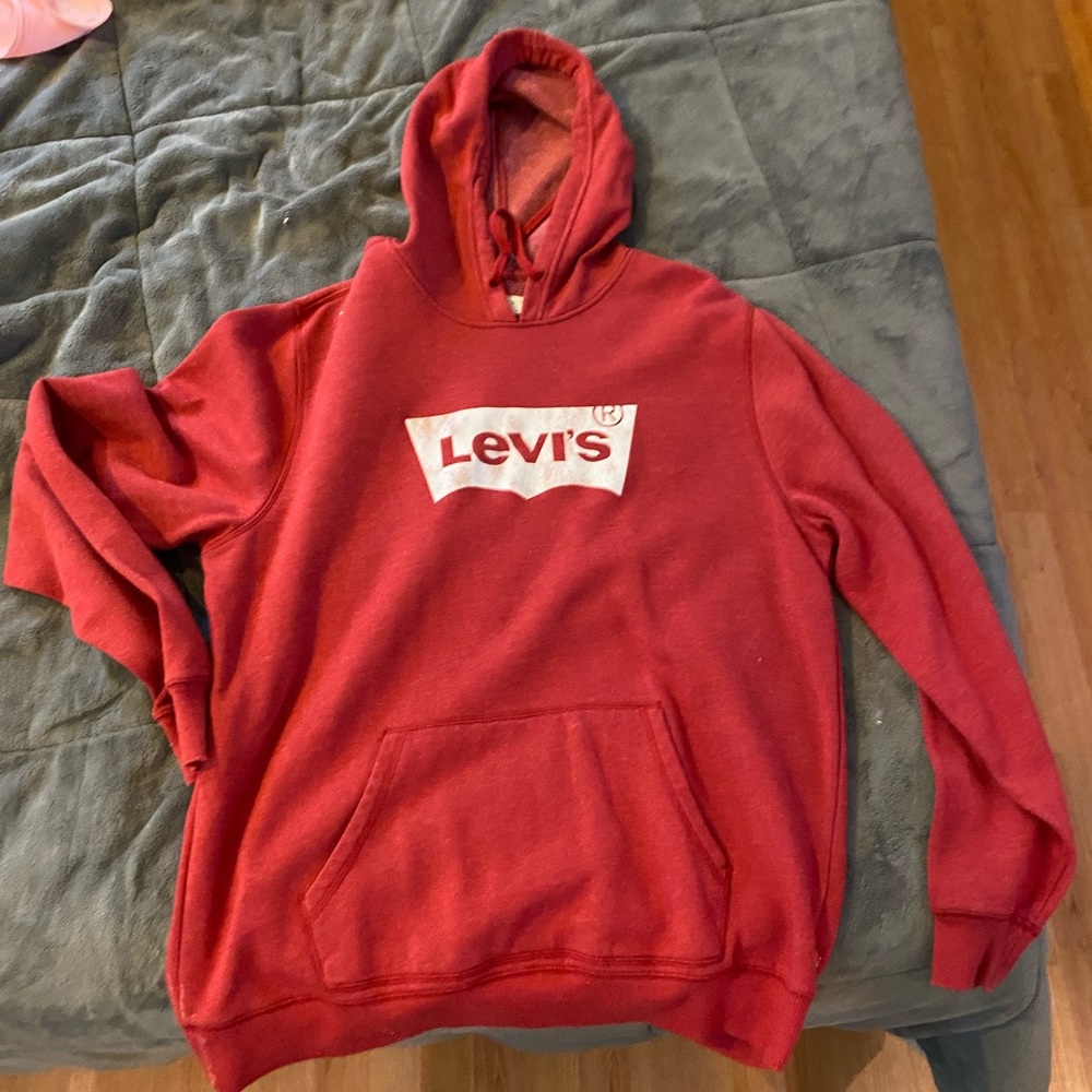 Levi’s red sweatshirt. Great for women as well!